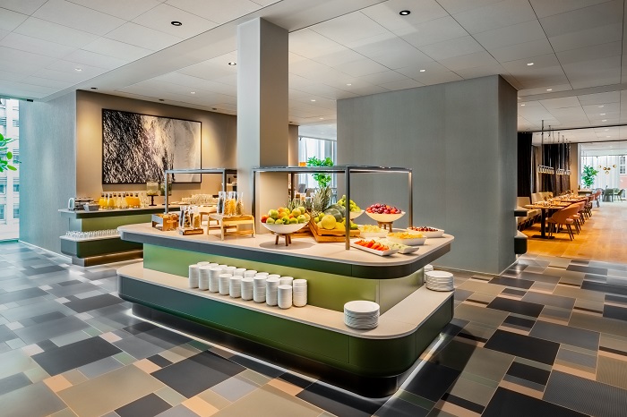 NH_Collection_Copenhagen_Buffet_breakfast_fruits_cereals_side_shot_with_breakfast_restaurant